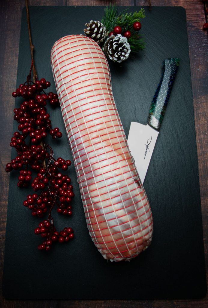 Lamb Roll stuffed (Vine Leaves, Cheese)